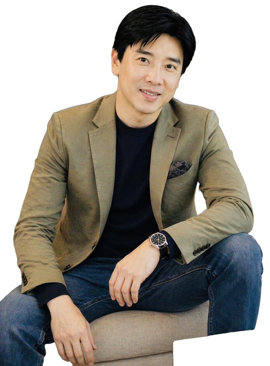 Ivan Teh seated in a tan blazer, accompanying a report on the Fusionex CARES programme